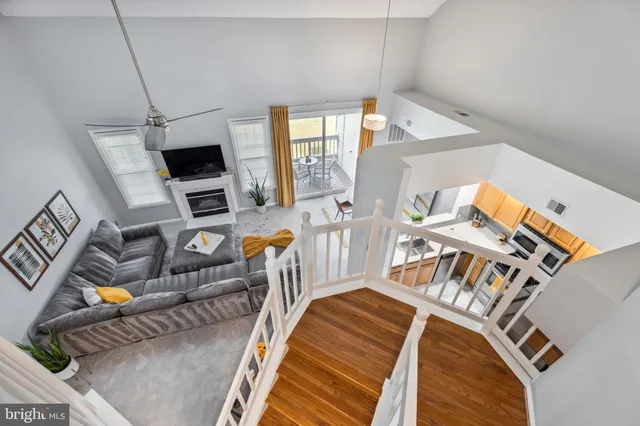 a bedroom with furniture and a flat screen tv