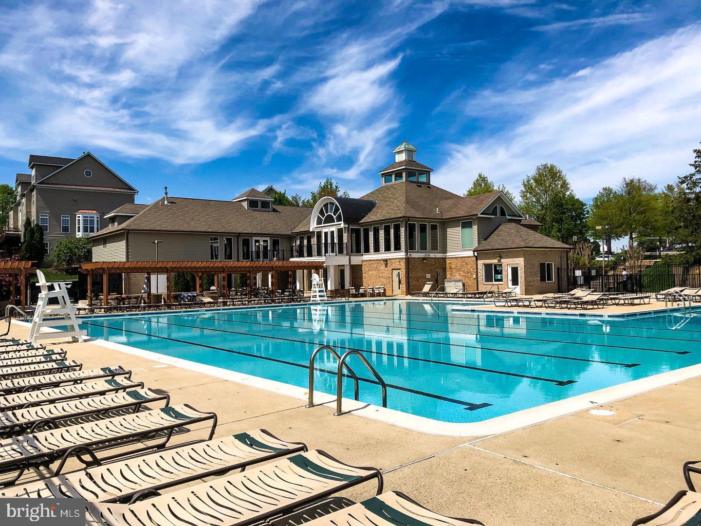 6934F Ellingham Circle Alexandria, VA 22315 - Photo 24 of 34 a view of a house with a swimming pool