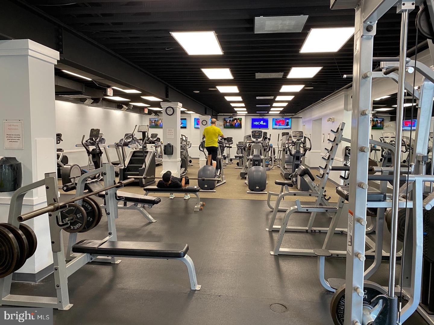 6934F Ellingham Circle Alexandria, VA 22315 - Photo 27 of 34 a view of a room with gym equipment