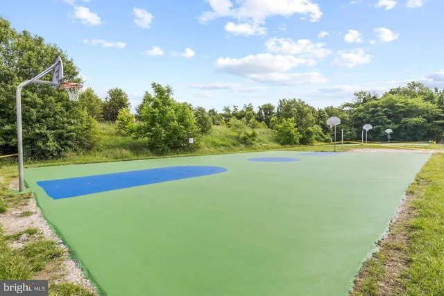 a view of yard with swimming pool and outdoor seating