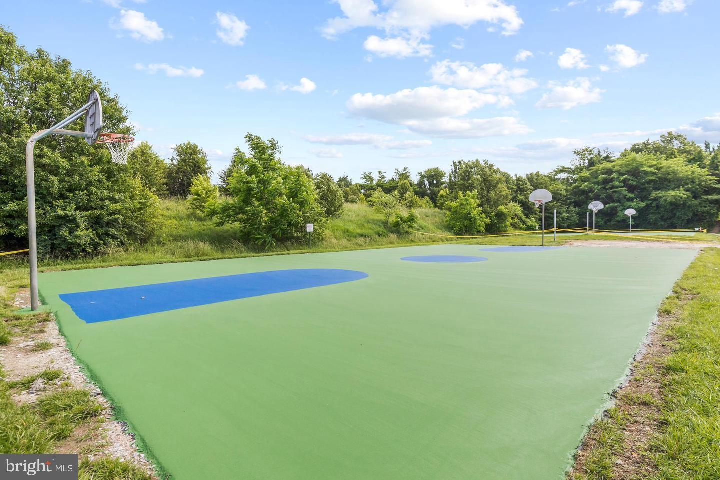 6934F Ellingham Circle Alexandria, VA 22315 - Photo 28 of 34 a view of yard with swimming pool and outdoor seating