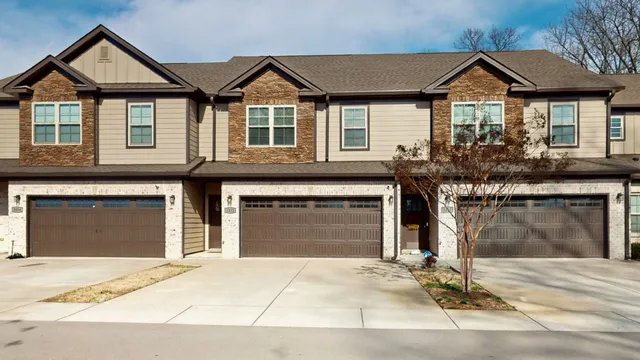 an aerial view of a house with a garden