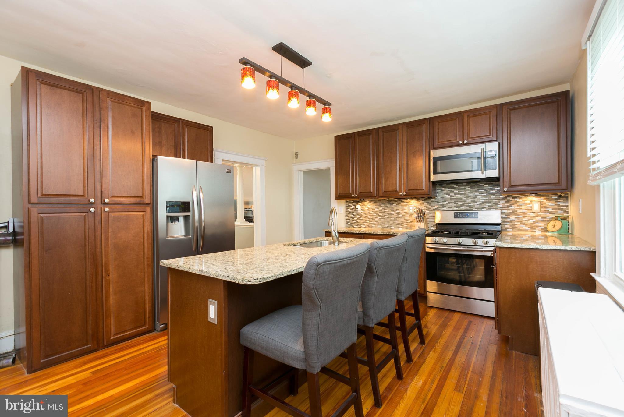 1414 Sulphur Spring Road Baltimore, MD 21227 - Photo 11 of 24 Updated Kitchen with Breakfast Bar