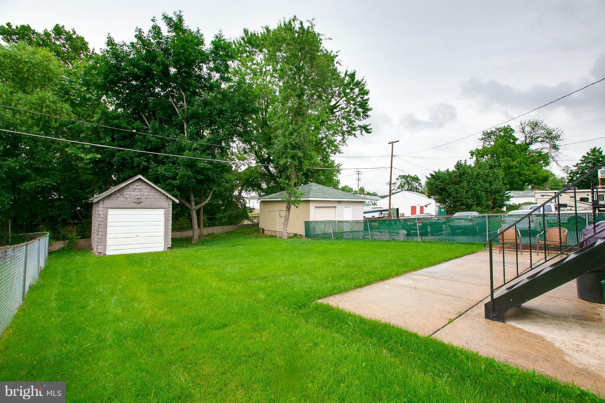 1414 Sulphur Spring Road Baltimore, MD 21227 - Photo 23 of 24 Large Backyard with Patio