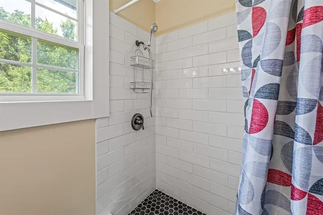 a bathroom with a shower