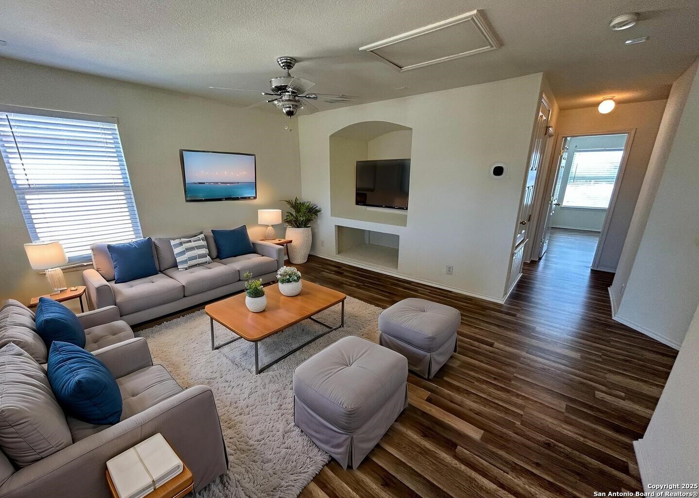 7714 Cold Mountain Converse, TX 78109 - Photo 13 of 27 a living room with furniture and a flat screen tv