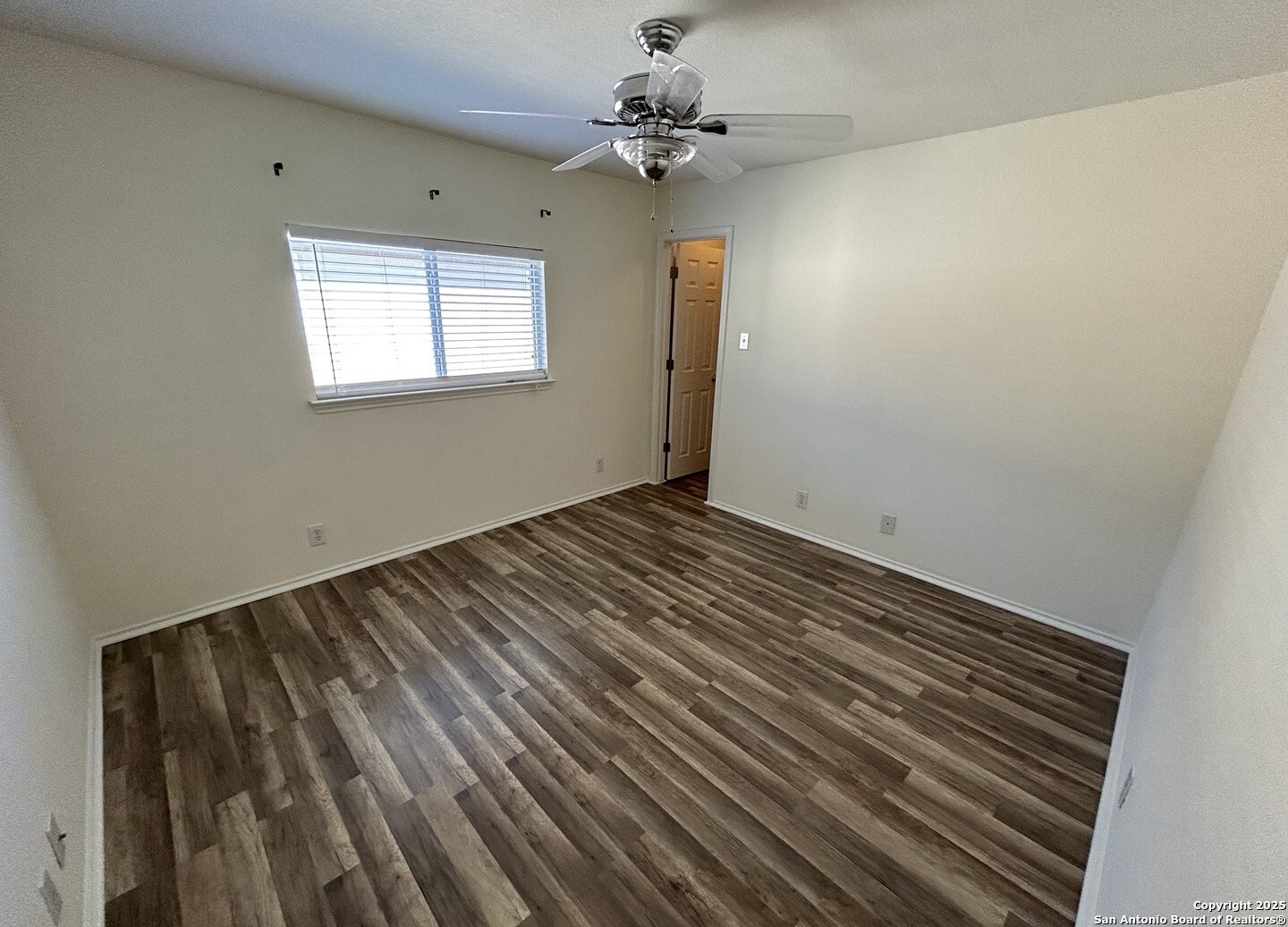7714 Cold Mountain Converse, TX 78109 - Photo 22 of 27 a view of an empty room with a window