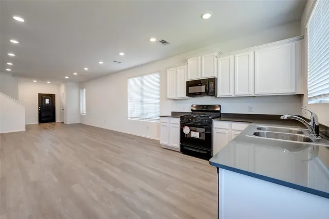 an empty room with windows