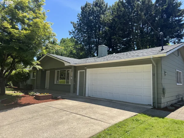 a view of a house with a garage