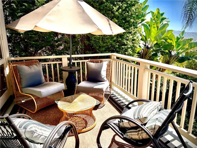 a bed room with a bed and a chair