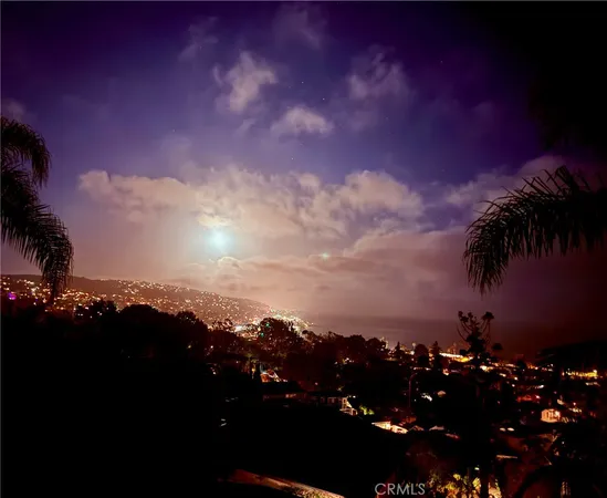 a view of swimming pool from a balcony