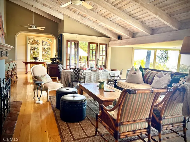 a view of a livingroom with furniture and a fireplace