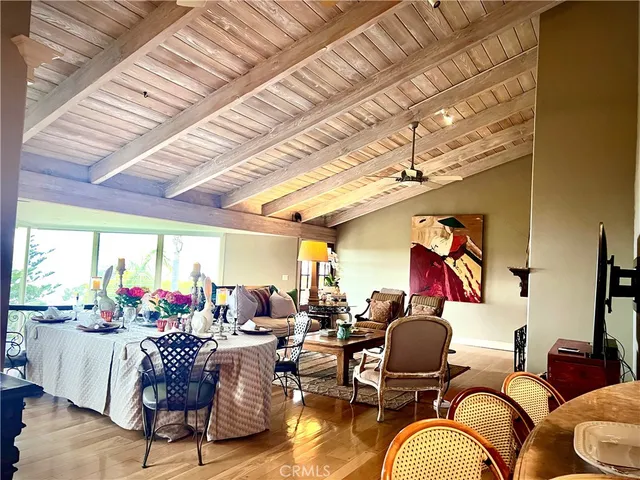 a kitchen with wooden cabinets and a stove top oven