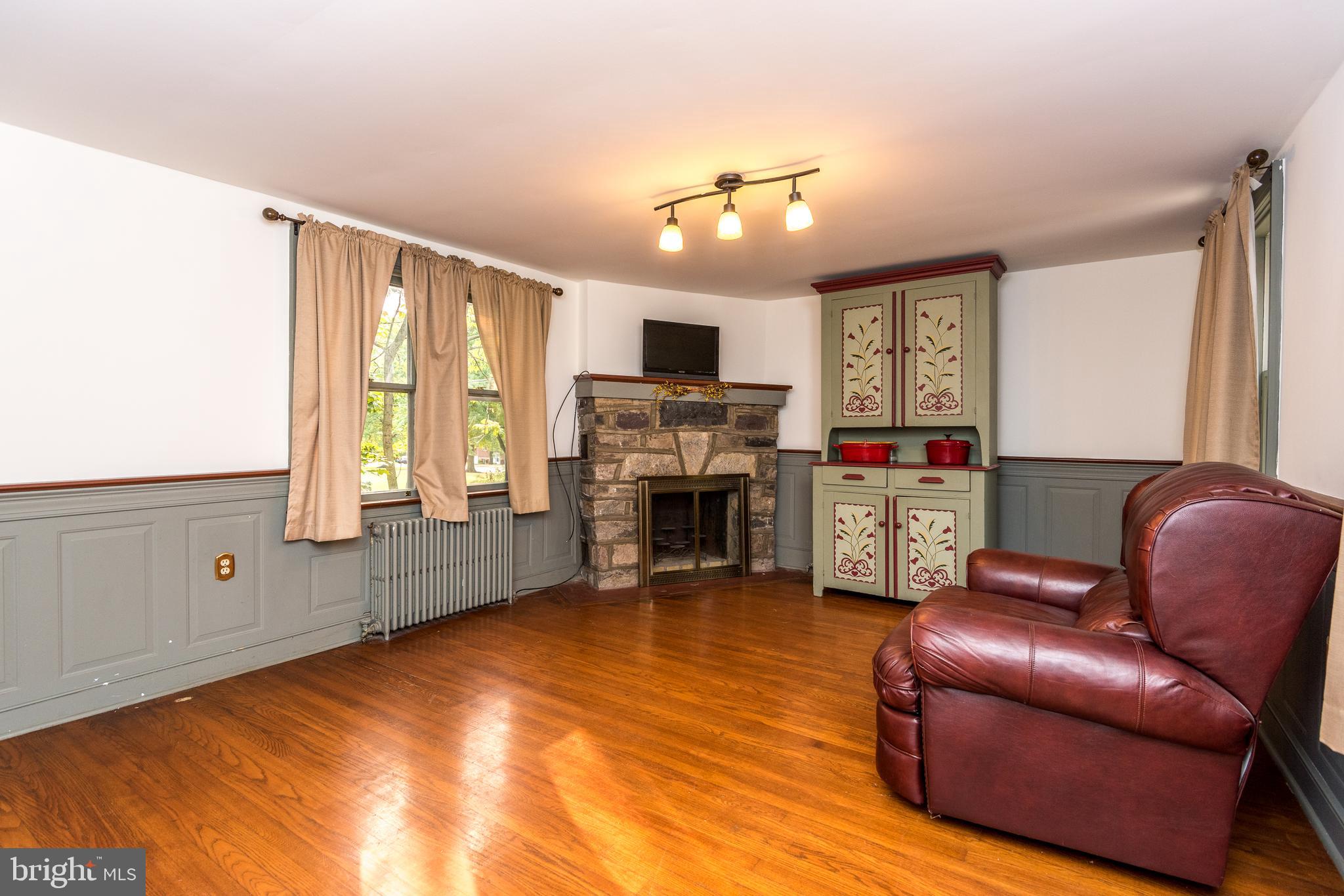 218 North Ridge Road Perkasie, PA 18944 - Photo 9 of 28 Dining Room w/ Stone Fireplace