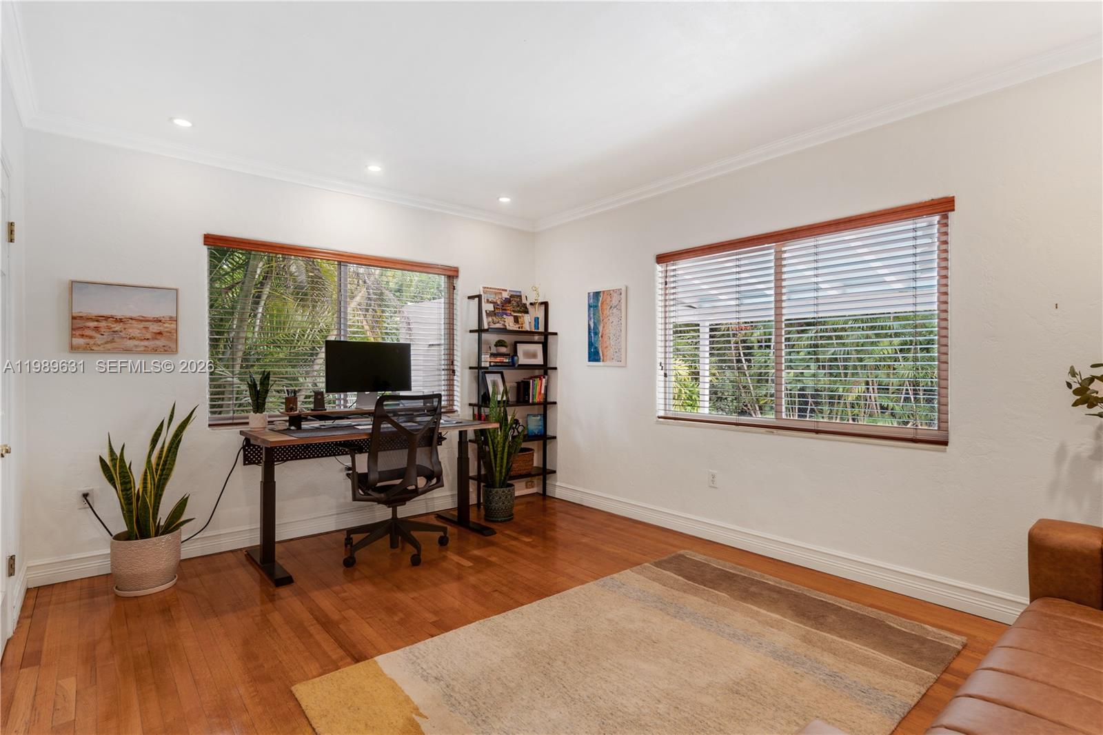 426 Hardee Road Coral Gables, FL 33146 - Photo 11 of 20 a view of a livingroom with workspace and a window