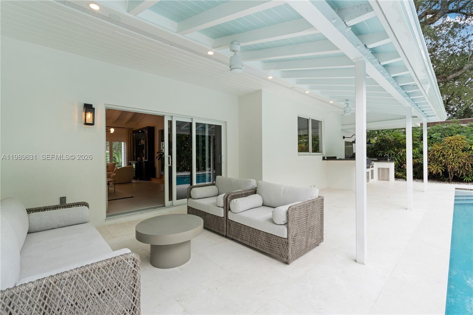 426 Hardee Road Coral Gables, FL 33146 - Photo 17 of 20 a living room with furniture and a large window