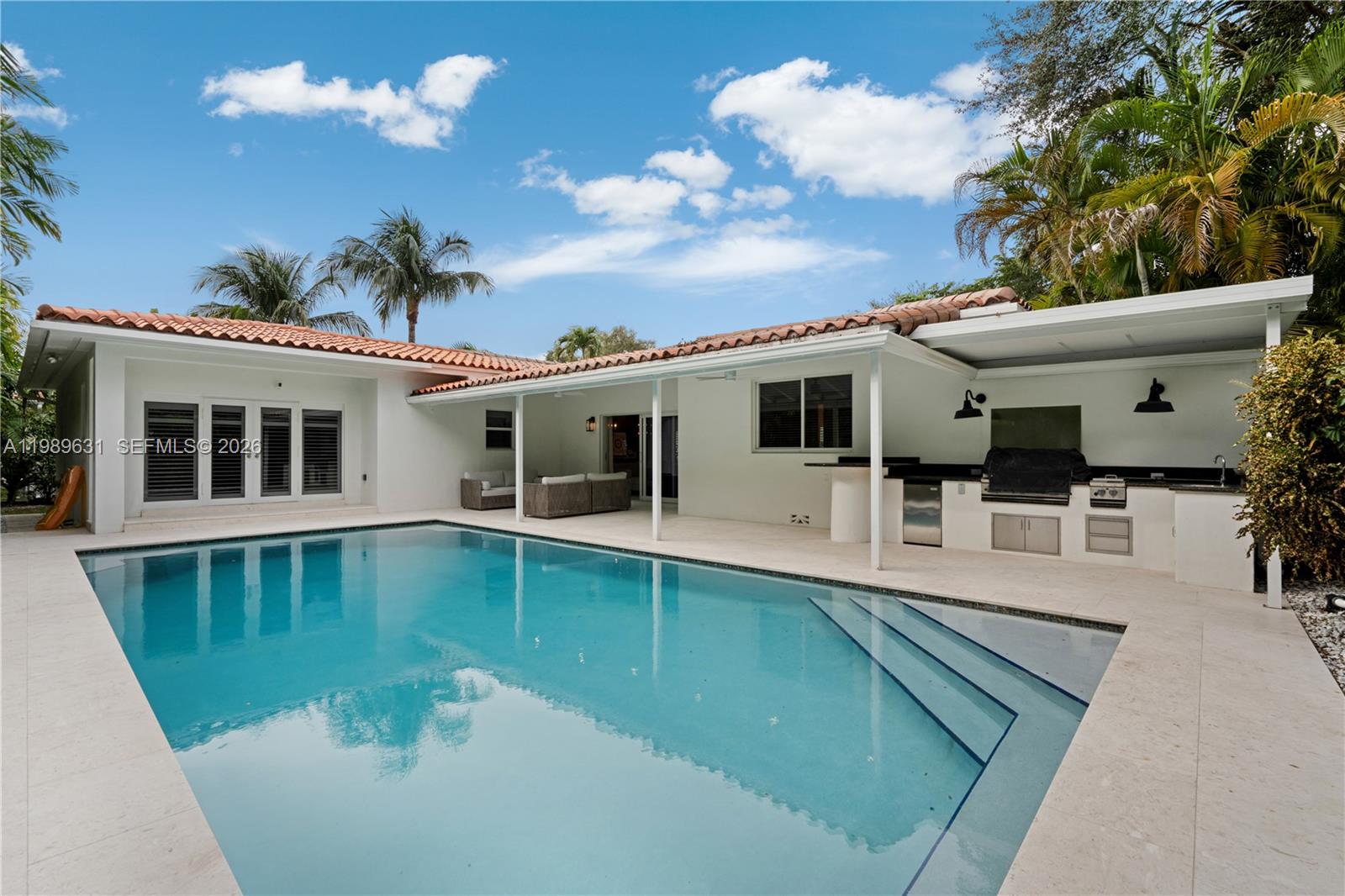 426 Hardee Road Coral Gables, FL 33146 - Photo 18 of 20 a view of a house with pool