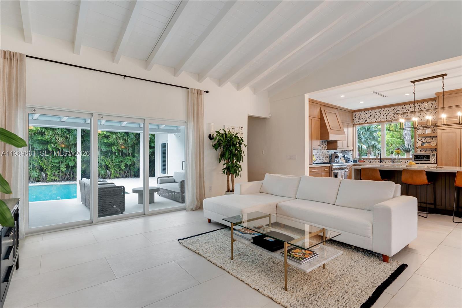 426 Hardee Road Coral Gables, FL 33146 - Photo 3 of 20 a living room with furniture and a large window