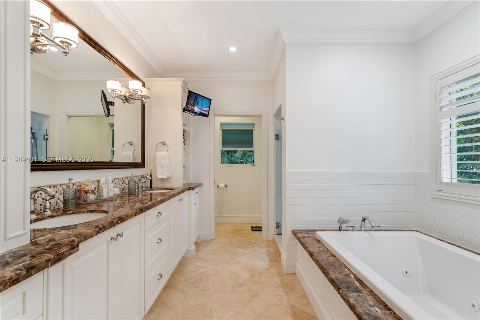 426 Hardee Road Coral Gables, FL 33146 - Photo 8 of 20 a bathroom with a bathtub and a sink