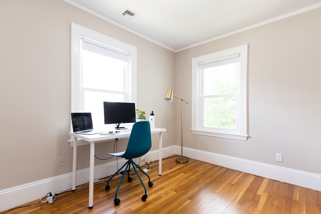 156-158 Trapelo Road Belmont, MA 02478 - Photo 15 of 20 a view of a workspace with furniture and a window