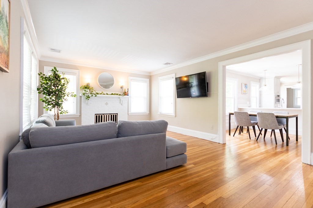 156-158 Trapelo Road Belmont, MA 02478 - Photo 5 of 20 a living room with furniture and a flat screen tv