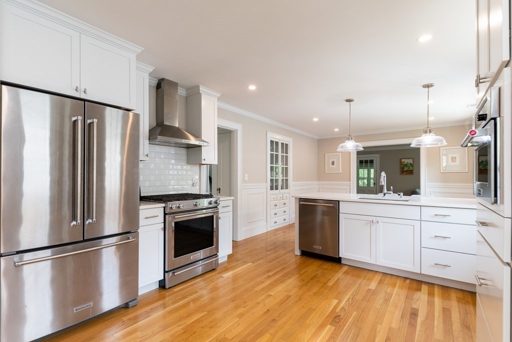 156-158 Trapelo Road Belmont, MA 02478 - Photo 9 of 20 a kitchen with a refrigerator sink and stainless steel appliances