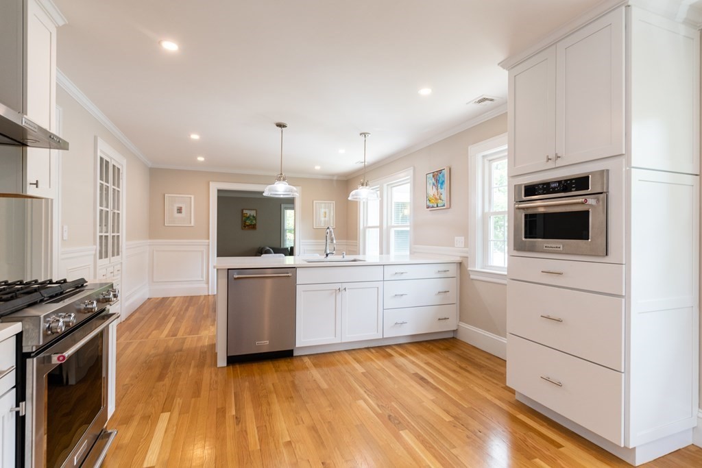156-158 Trapelo Road Belmont, MA 02478 - Photo 10 of 20 a kitchen with a sink stove and refrigerator