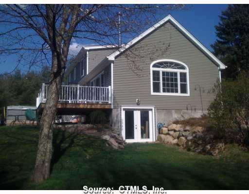 245 Chesterfield Road Montville, CT 06370 - Photo 1 of 1 a front view of a house with a garden