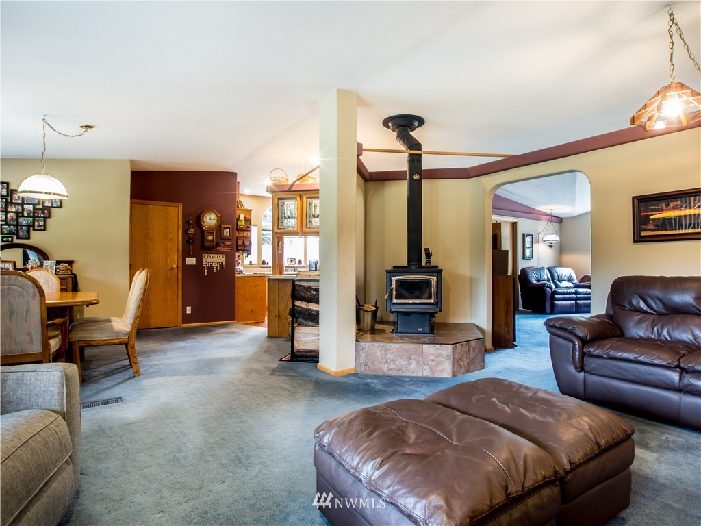 8941 Heady Road Maple Falls, WA 98266 - Photo 13 of 40 a living room with furniture and a flat screen tv