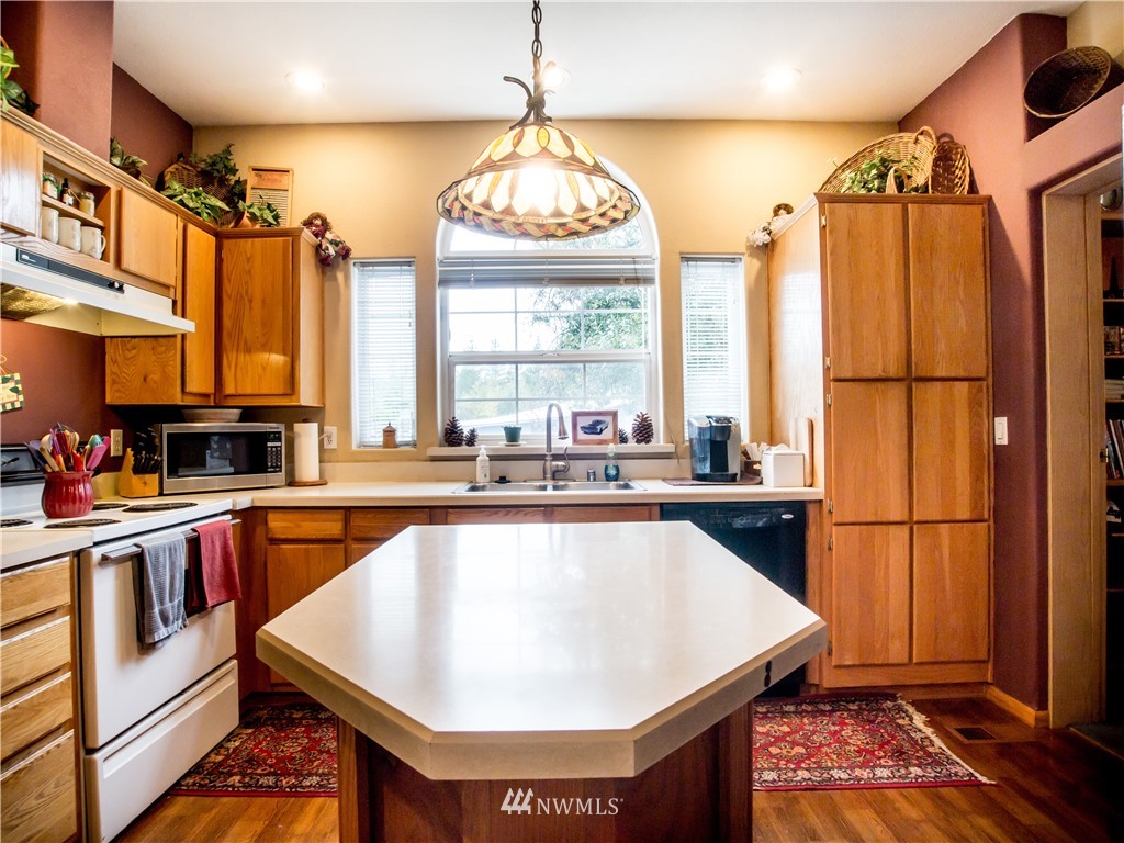 8941 Heady Road Maple Falls, WA 98266 - Photo 18 of 40 a kitchen with lots of counter top space and appliances