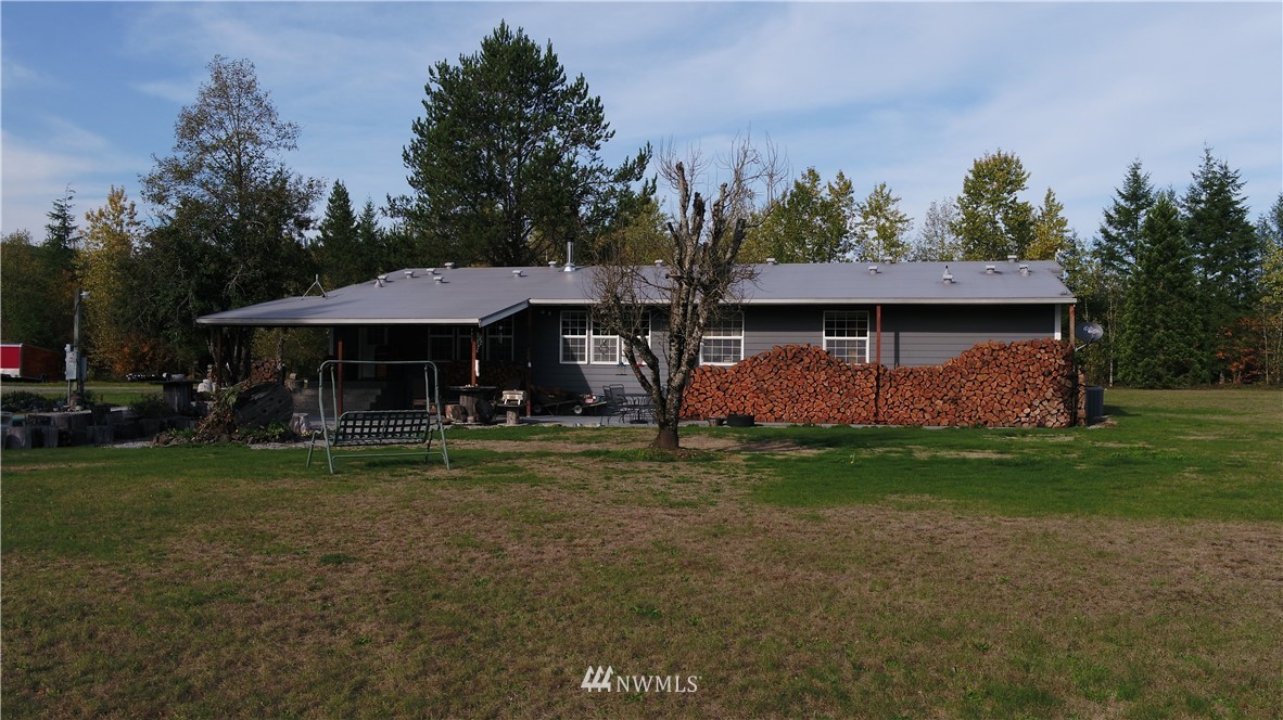 8941 Heady Road Maple Falls, WA 98266 - Photo 38 of 40 a house with trees in the background