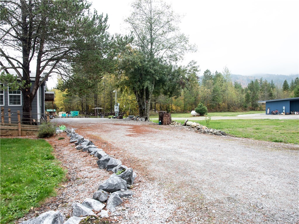 8941 Heady Road Maple Falls, WA 98266 - Photo 5 of 40 a view of outdoor space with garden and trees