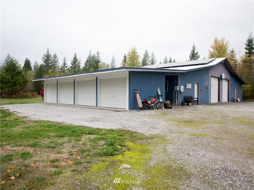 8941 Heady Road Maple Falls, WA 98266 - Photo 10 of 40 a view of a house with backyard and porch