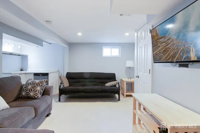 a living room with furniture and a couch