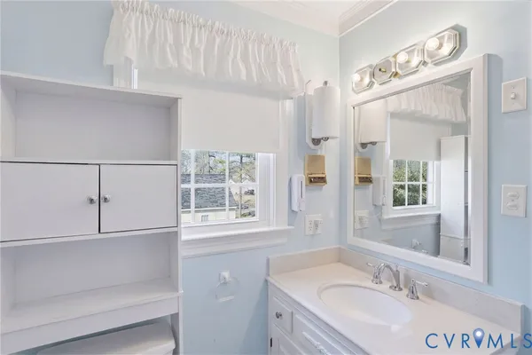 a bathroom with a sink and a bathtub