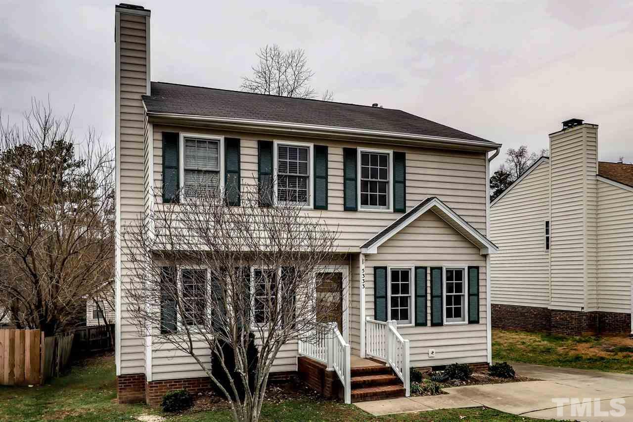 5333 Spring Pines Way Raleigh, NC 27616 - Photo 1 of 25 a view of a white house with large windows and a small yard