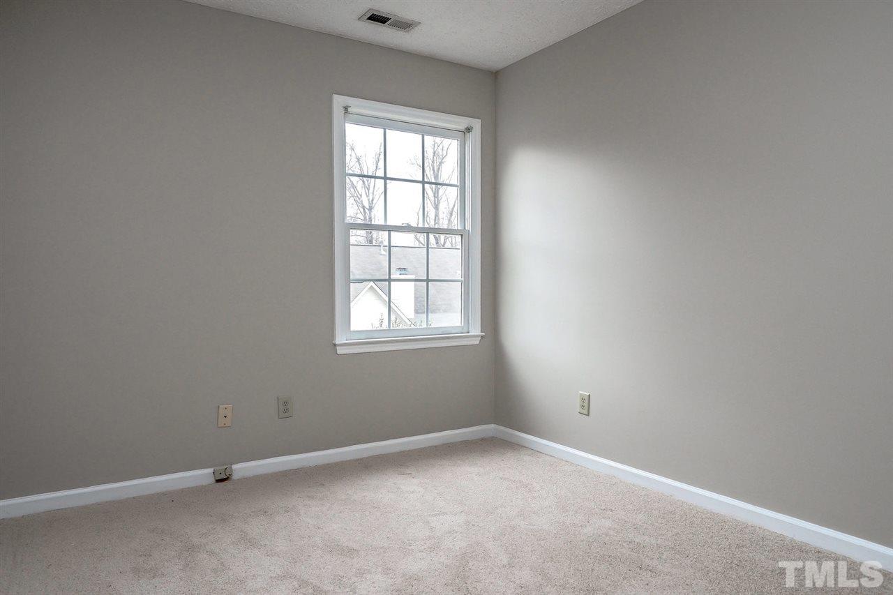 5333 Spring Pines Way Raleigh, NC 27616 - Photo 17 of 25 an empty room with a window
