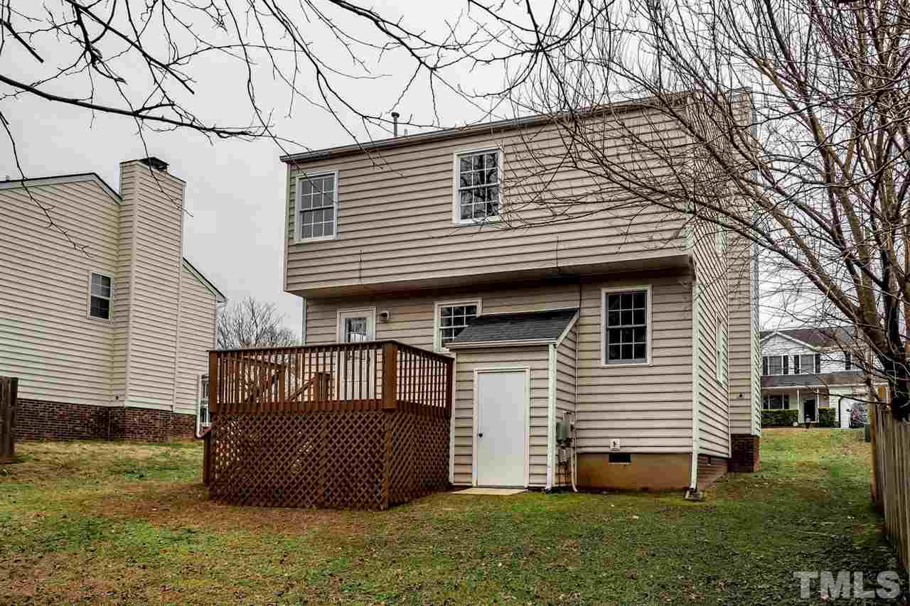 5333 Spring Pines Way Raleigh, NC 27616 - Photo 22 of 25 a view of a house with a yard