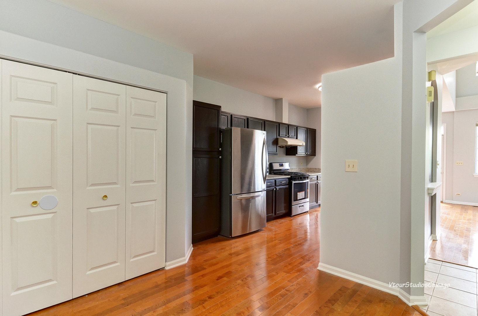 5451 Elizabeth Place Rolling Meadows, IL 60008 - Photo 4 of 34 a kitchen with stainless steel appliances granite countertop a refrigerator and a sink
