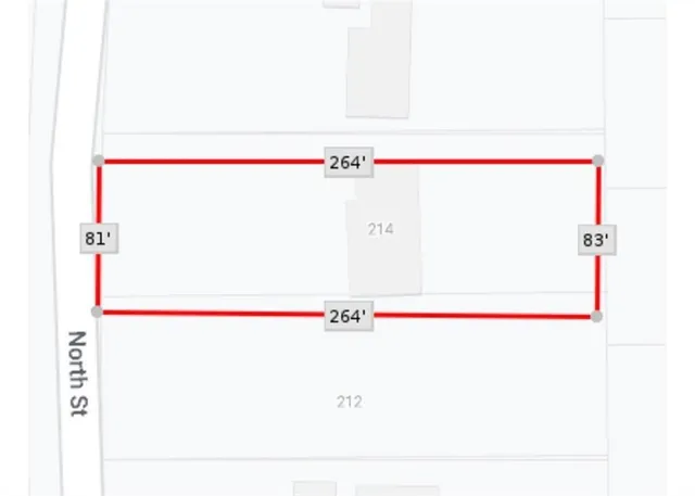 an aerial view of residential house with outdoor space