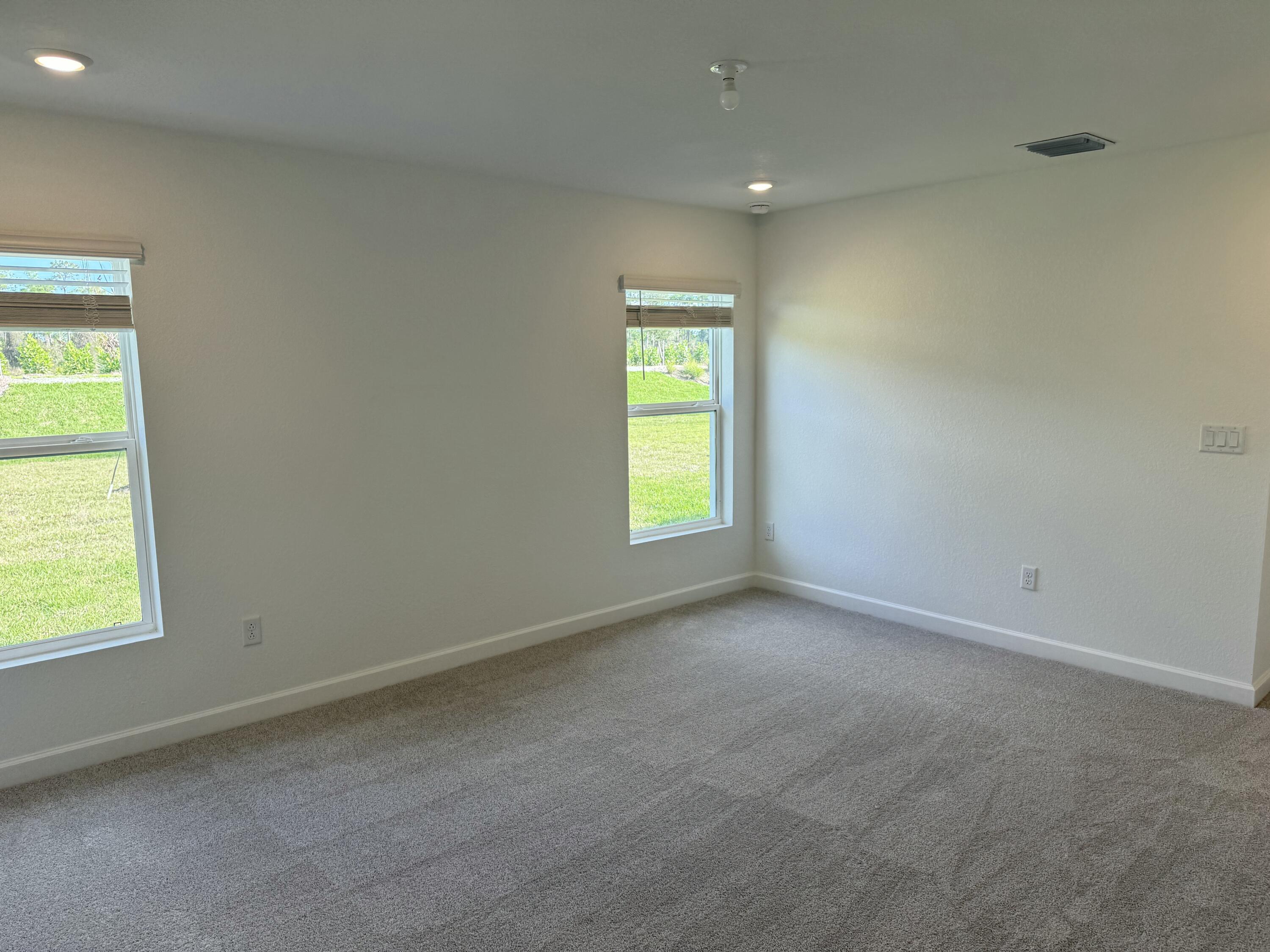 10501 Northwest Suncrest Loop Port St. Lucie, FL 34987 - Photo 16 of 33 an empty room with a window