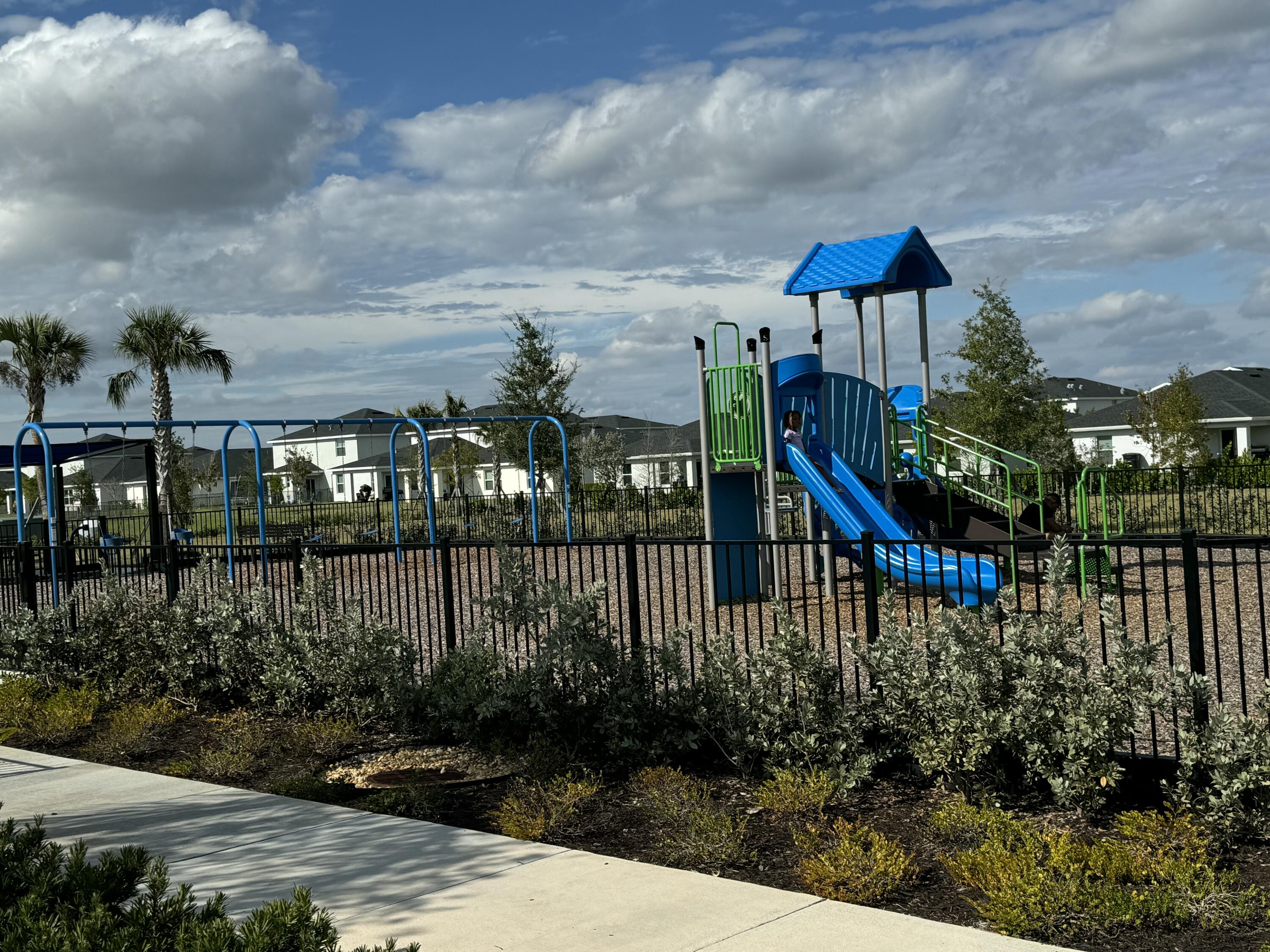 10501 Northwest Suncrest Loop Port St. Lucie, FL 34987 - Photo 25 of 33 a balcony with lots of green space