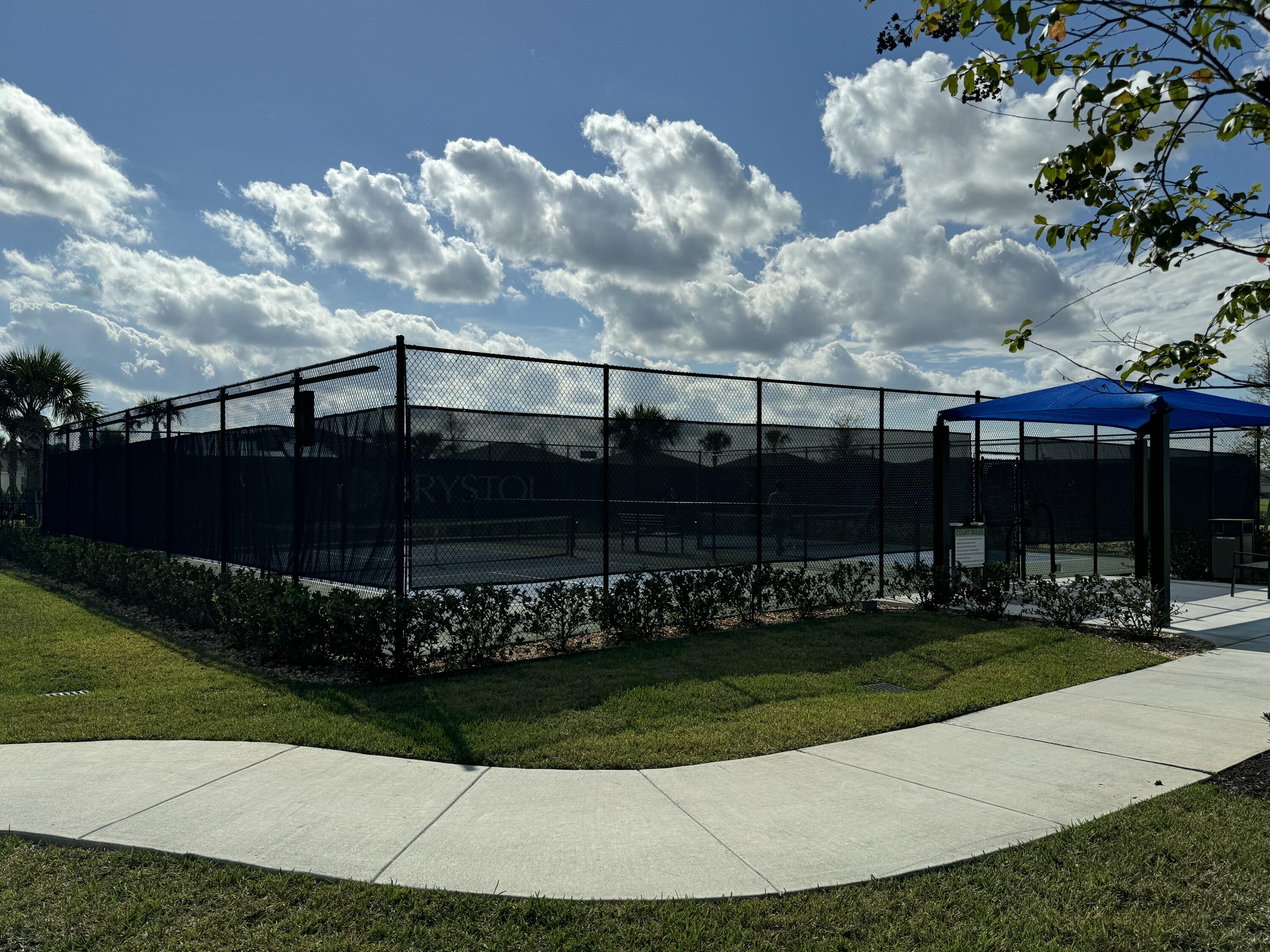 10501 Northwest Suncrest Loop Port St. Lucie, FL 34987 - Photo 29 of 33 a view of a garden