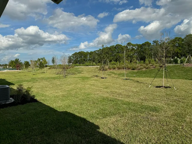 a view of a golf course with a lake