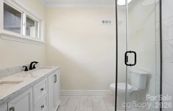 a backyard of a house with trees