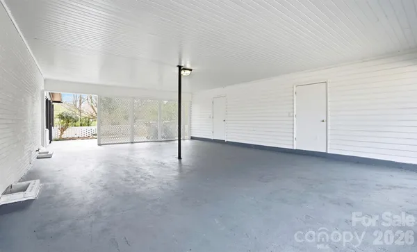 a view of yard with swimming pool