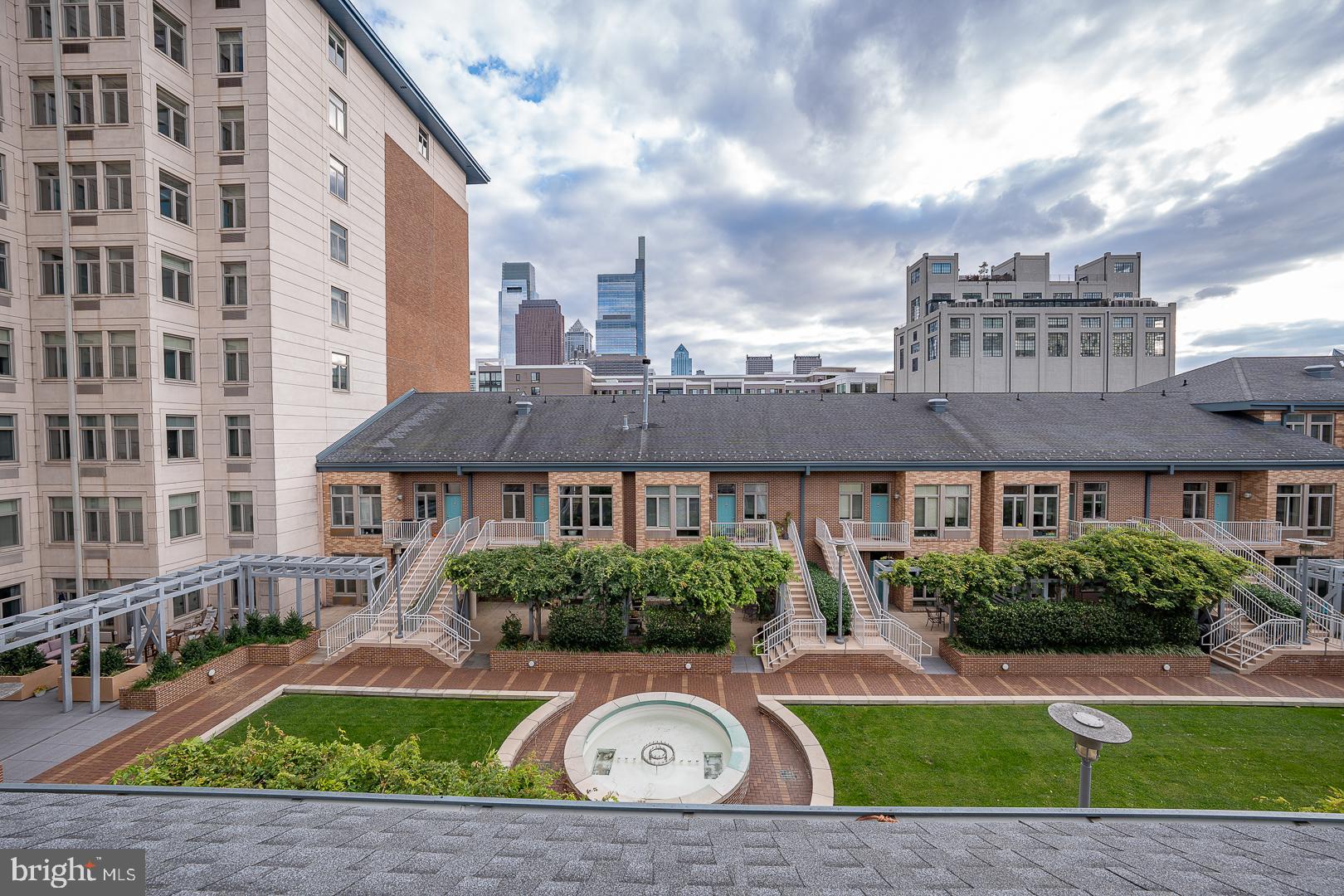 1900 Hamilton Street, Unit D19 Philadelphia, PA 19130 - Photo 2 of 36 a front view of a house with garden