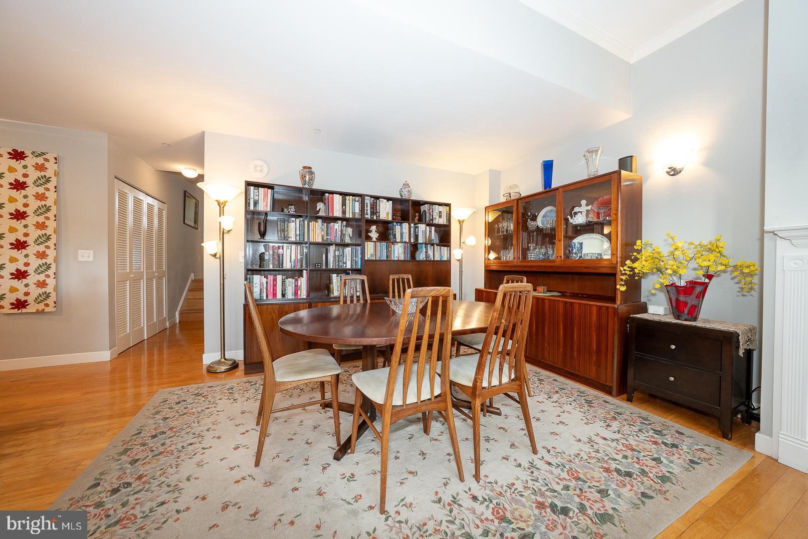 1900 Hamilton Street, Unit D19 Philadelphia, PA 19130 - Photo 9 of 36 a dining room with furniture and a flat screen tv