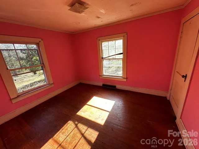 a view of an empty room and window