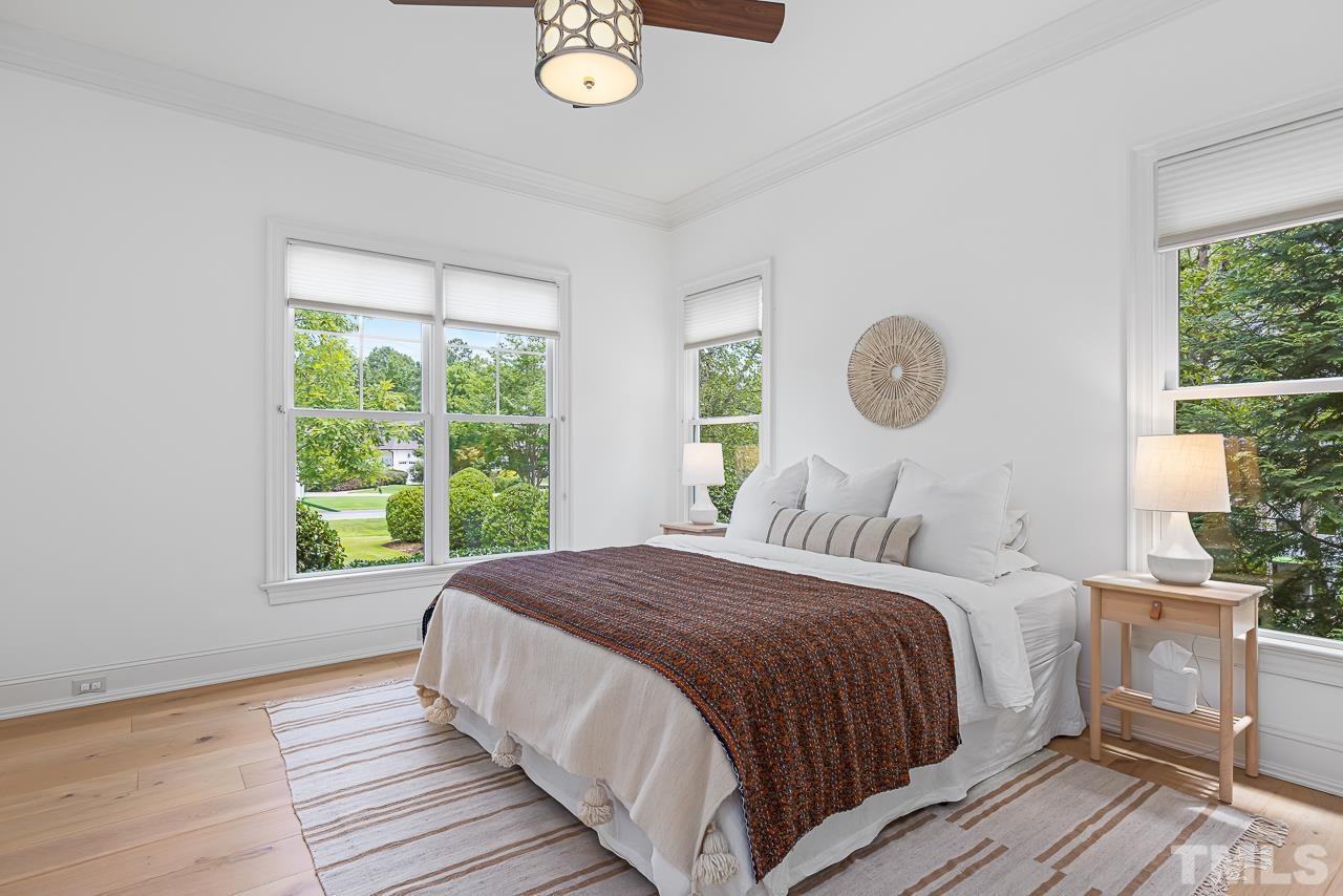 18 Crimson Oak Drive Durham, NC 27713 - Photo 22 of 87 a bedroom with a bed and a window